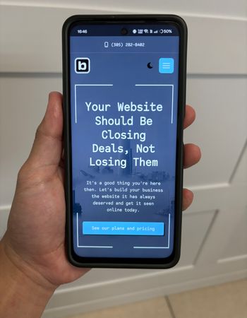 Image of a phone displaying a mobile-friendly website