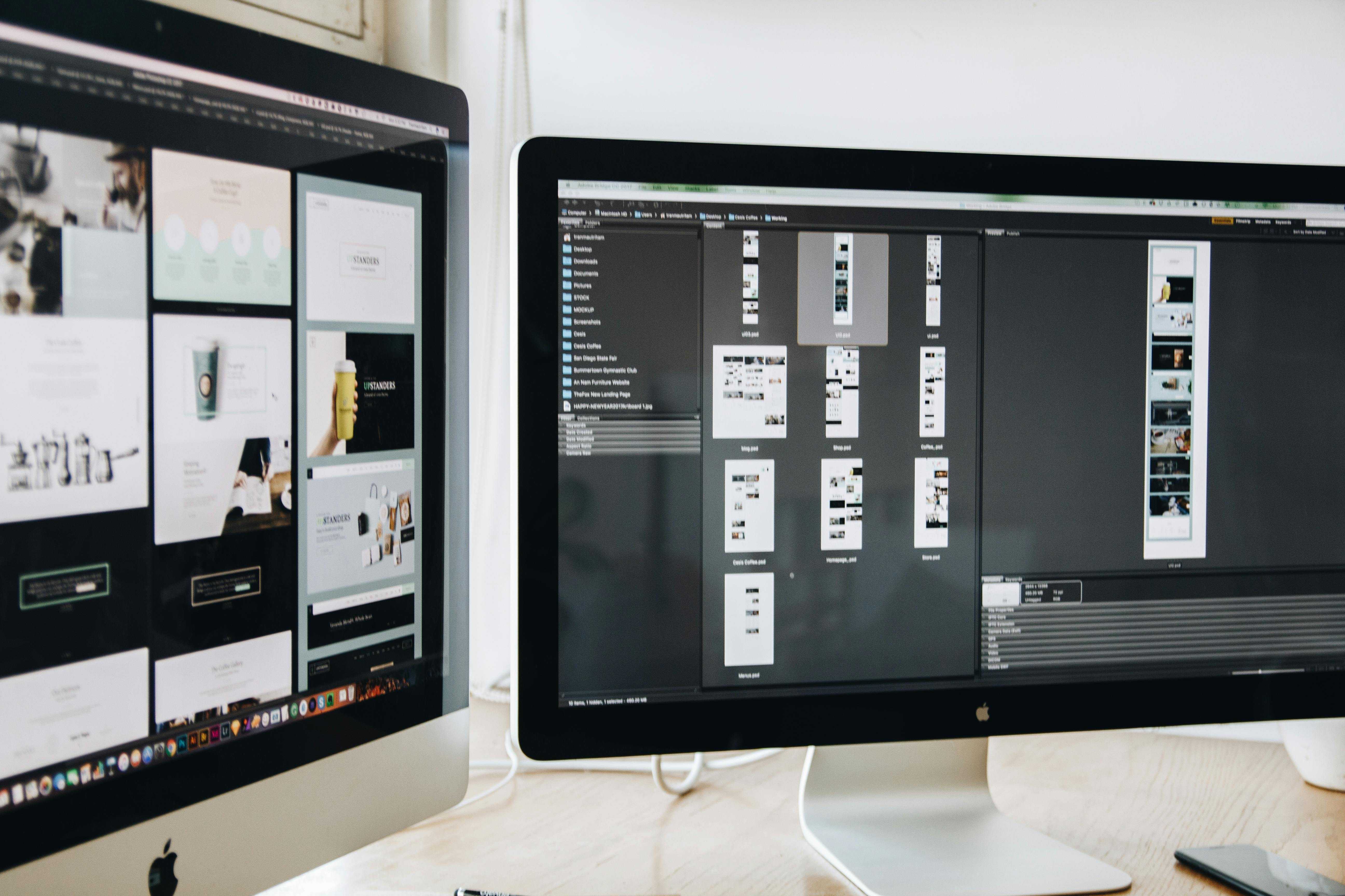 A web design software being displayed on two monitors